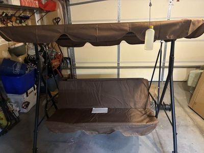 Outdoor Patio Swing Bench with Canopy - Brown 3-Seater Glider and a black one