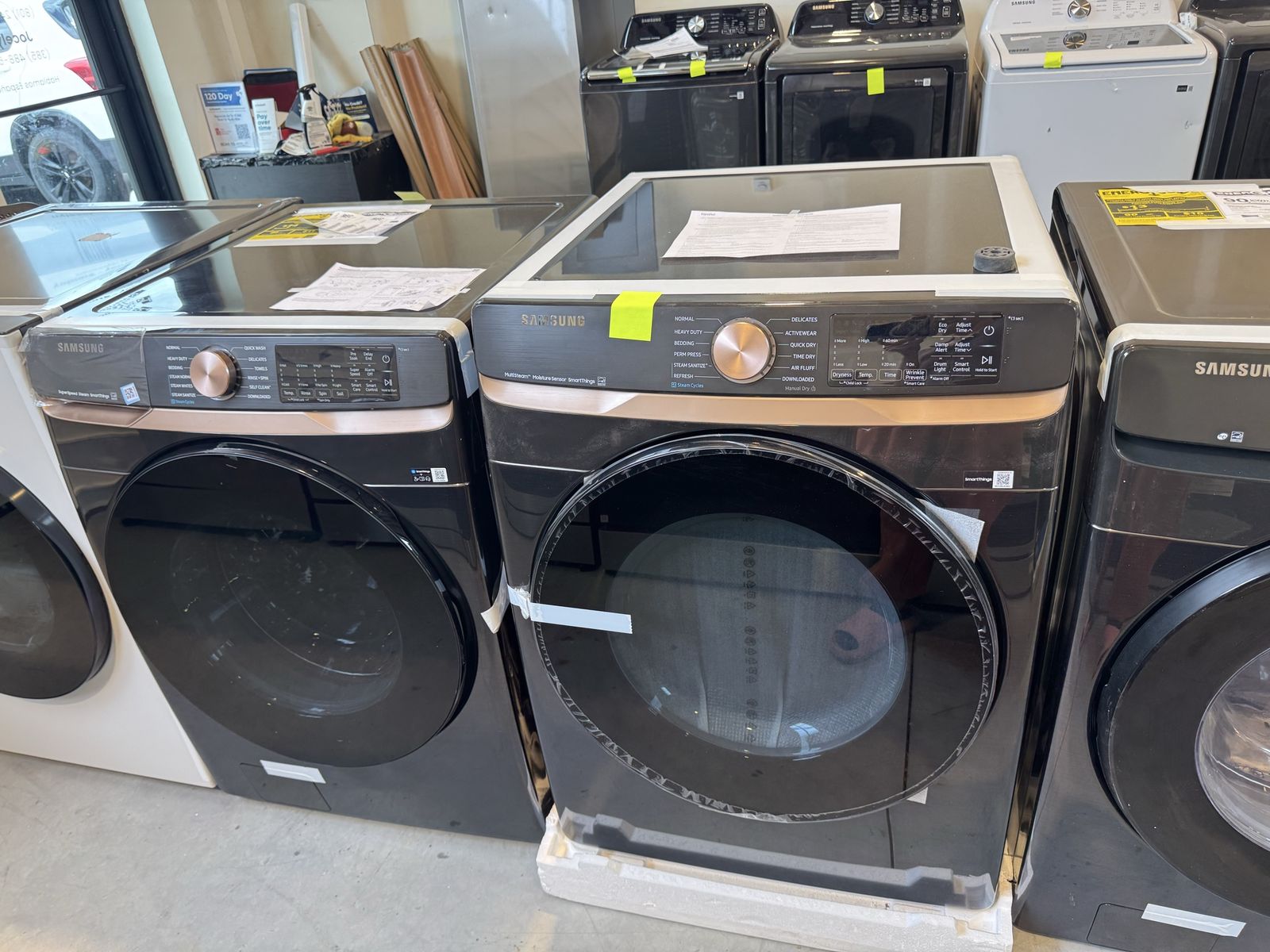 New scratch and dent Samsung 5.0 cu. ft. Extra Large Capacity Smart Front Load Washer with Super Speed Wash and Samsung 7.5 cu.