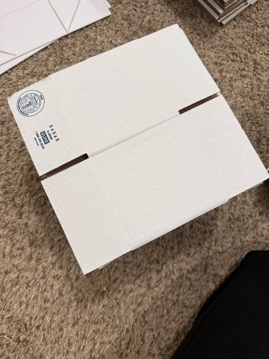 5x5x5 white Uline cardboard boxes