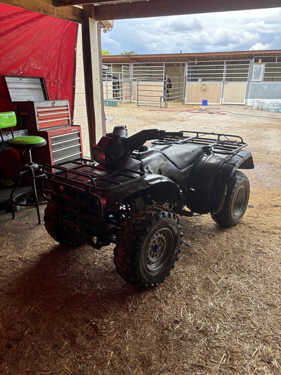 1999 Honda foreman 400 title in hand