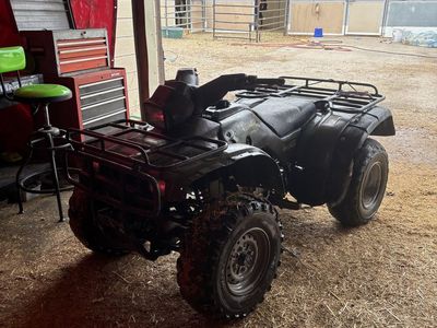 1999 Honda foreman 400 title in hand