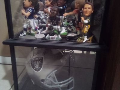 helmets and football cases or can display anything really