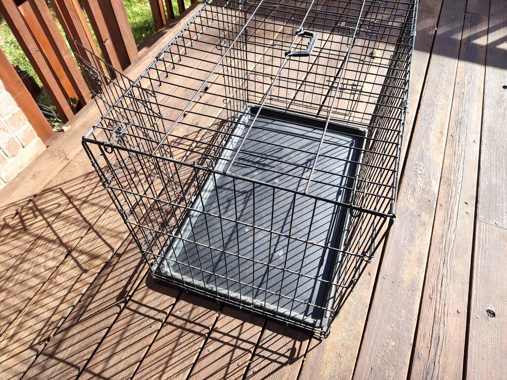 Large pet cage,  collapses flat