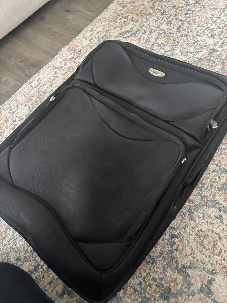 Jaguar Large Rolling Suitcase