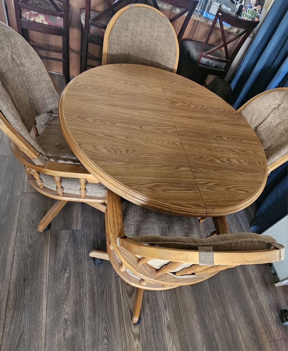 Vintage Oak Dining Table with 4 Swivel Caster Chairs
