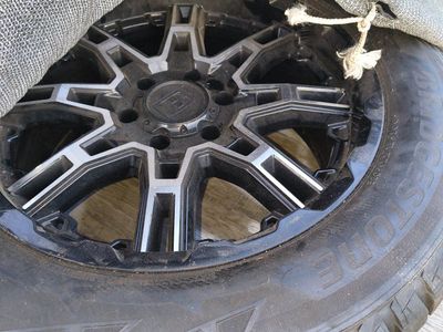 Bridgestone 275/55R20 117T Tires with Black/Machined Wheels - Set of 4 $120ea $400 for all OR TRADE FOR 18s 6X5.5 RIMS AND TIR