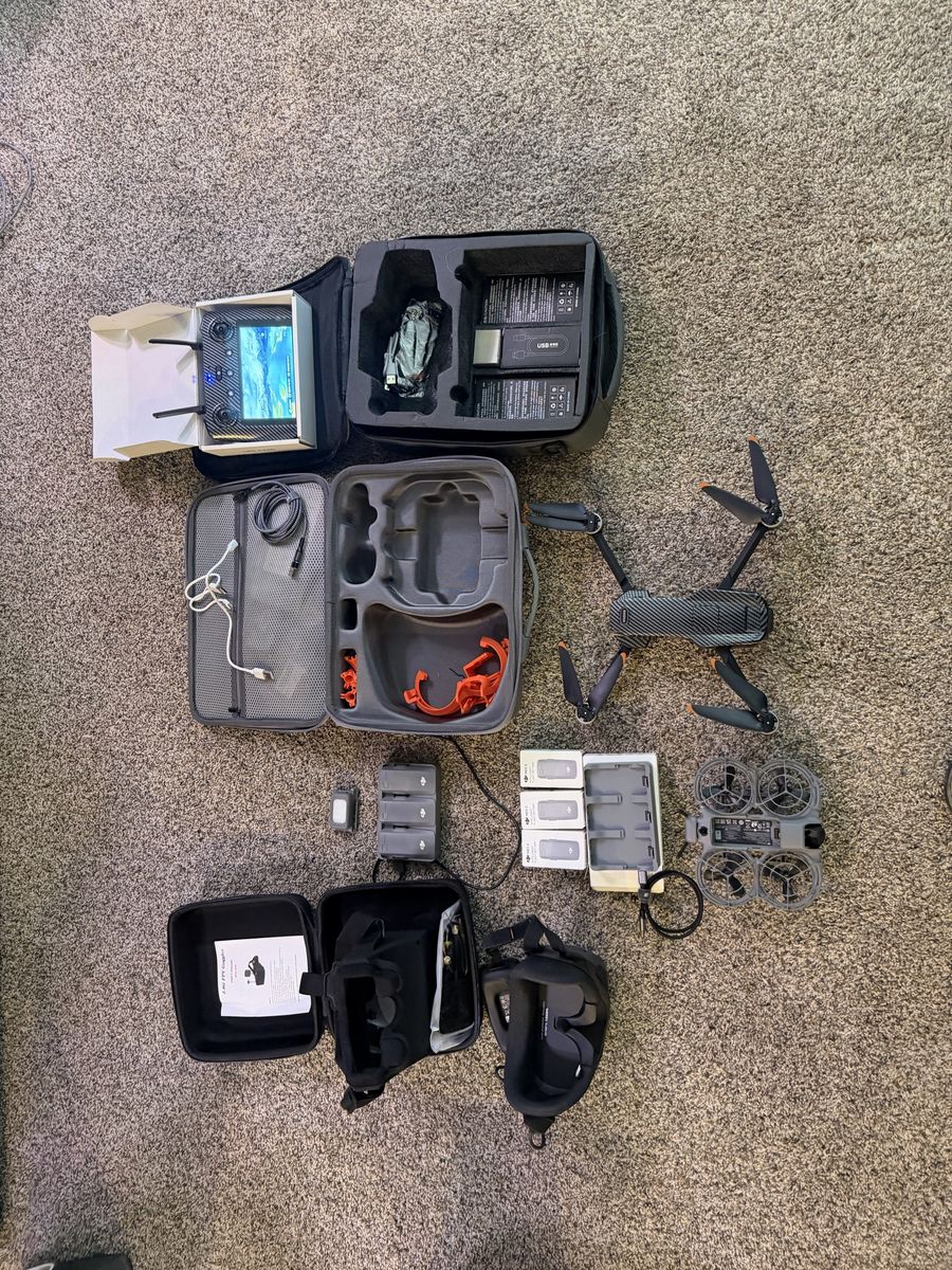 DJI Neo 2 with 2 sets of VR goggles and 6 batteries and a AE 86 pro max 2 30 to 45 min batteries and has a remote  cargo drop