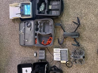 DJI Neo 2 with 2 sets of VR goggles and 6 batteries and a AE 86 pro max 2 30 to 45 min batteries and has a remote cargo drop