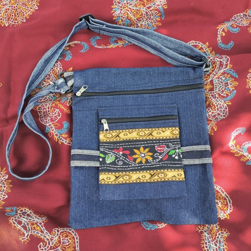 Blue Denim Crossbody Bag with Floral Embroidered Pocket Accent
