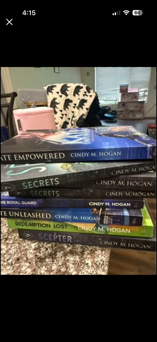 7 Cindy M. Hogan Suspense Books (Like New & Signed to "Ashley")