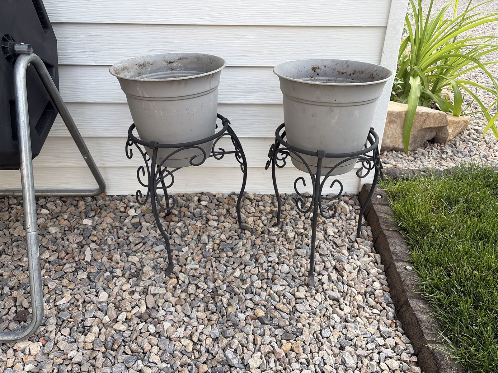 2 matching iron plant stands