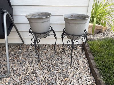 2 matching iron plant stands