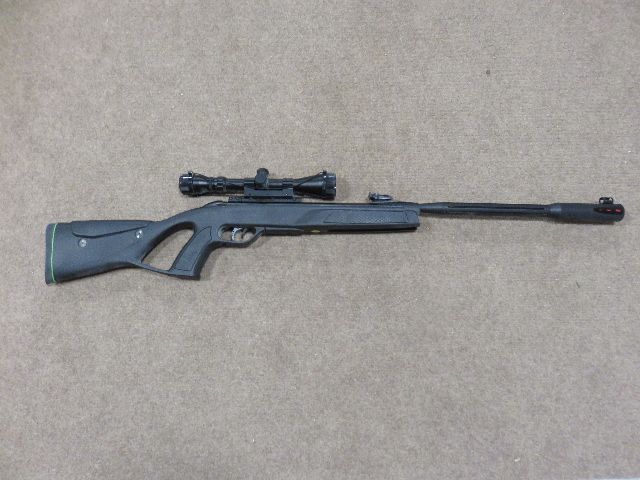 SIGHTED IN ONLY GAMO WHISPER FUSION ELITE .22 AIR RIFLE WITH 3X9X40 SCOPE