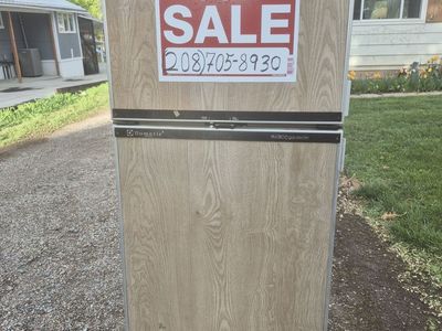 Propane and electric RV refrigerator