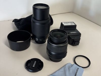 Two Nikon Camera Lenses For Dx Style Camera