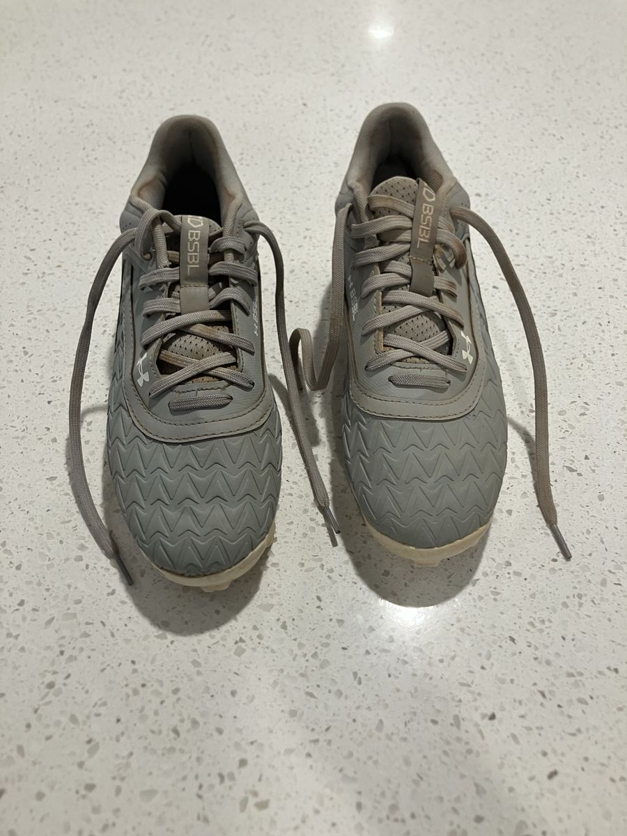 Gray baseball cleats