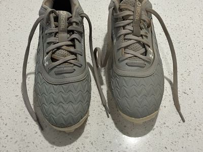 Gray baseball cleats