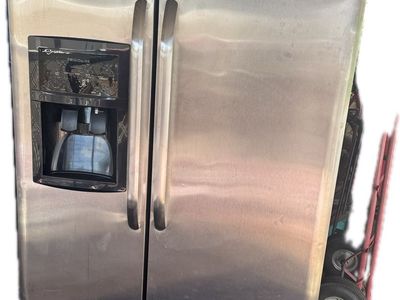 Frigidaire Side-by-Side Stainless Steel Refrigerator with Water Dispenser
