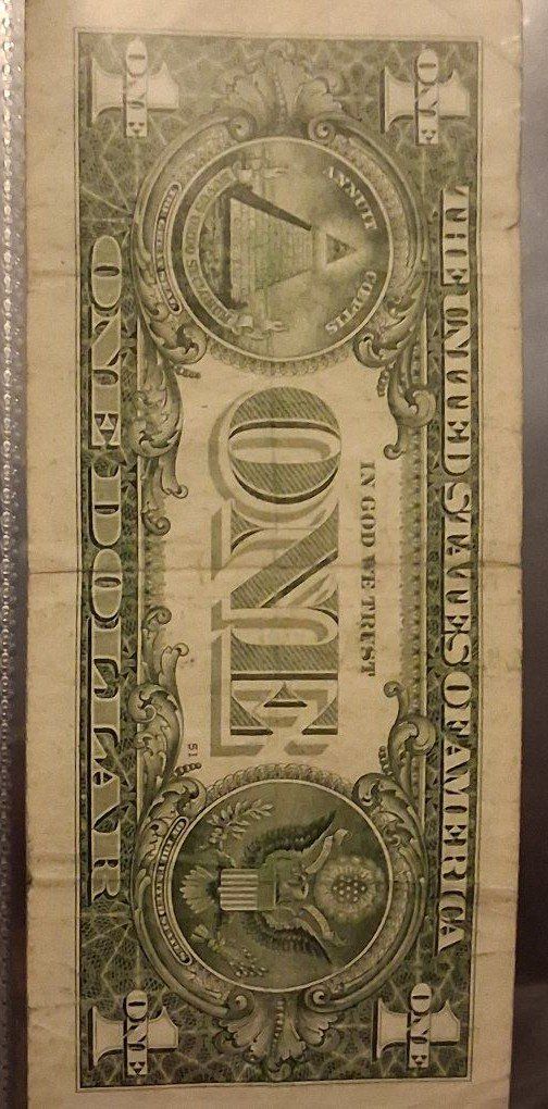 Look you one dollar bill.   
###     L 1 7 7 7 3 2 1 0 C    ###