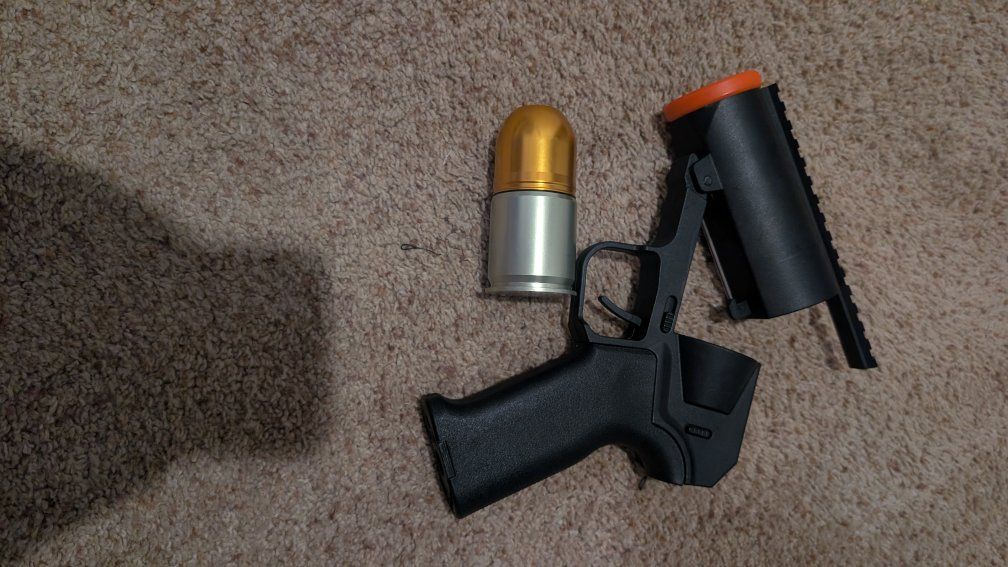 Grenade Launcher Airsoft Gun - Black with Gold Grenade