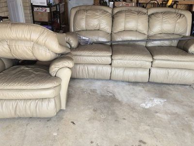 Recliner leather couch and chair.