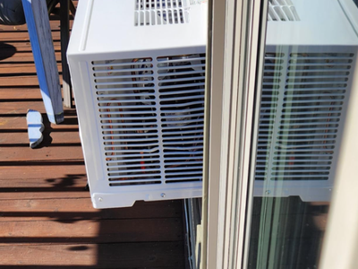 New in box 10,000 BTU Window Air Conditioner and Dehumidifier