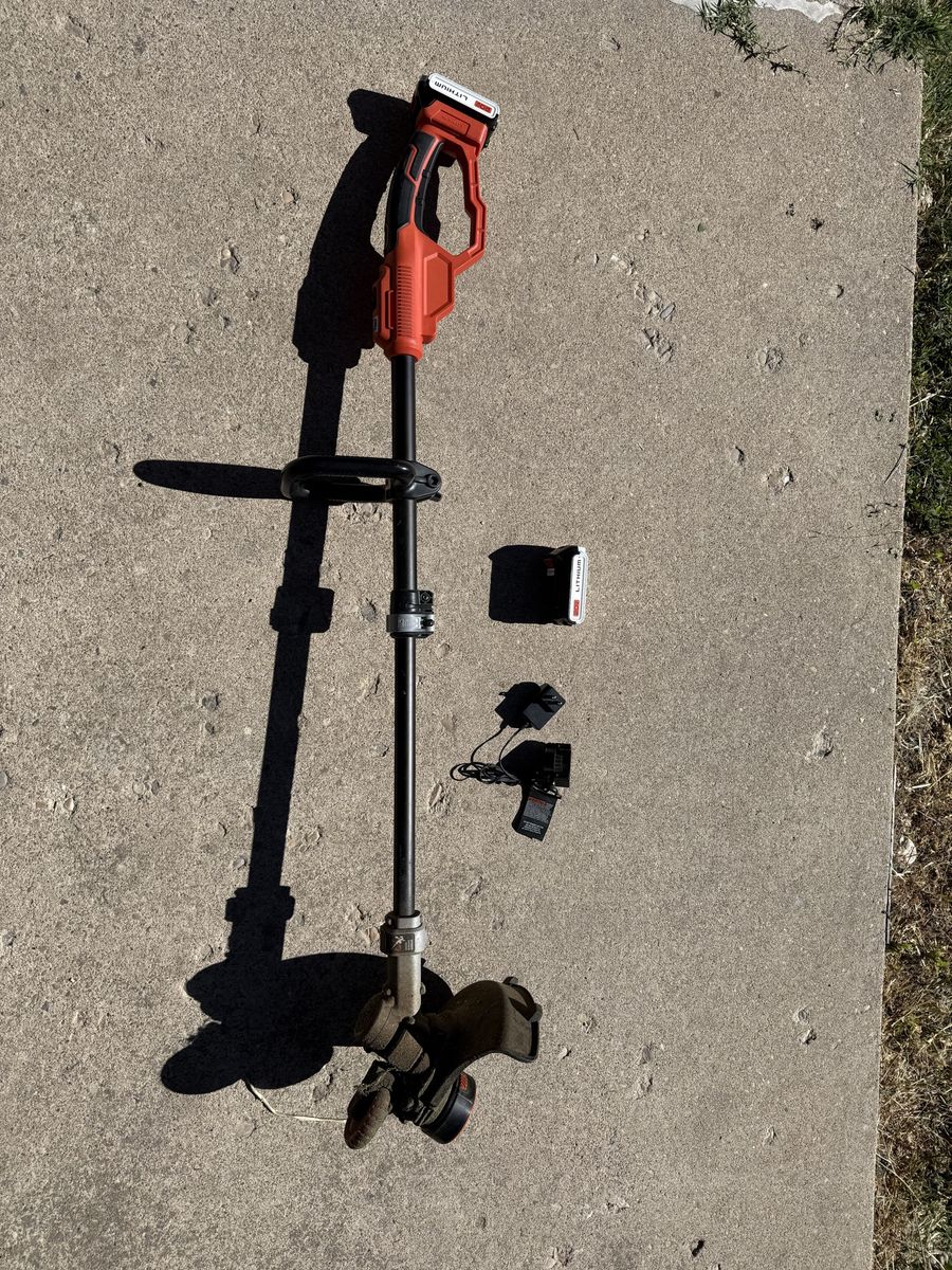 Battery powered string trimmer