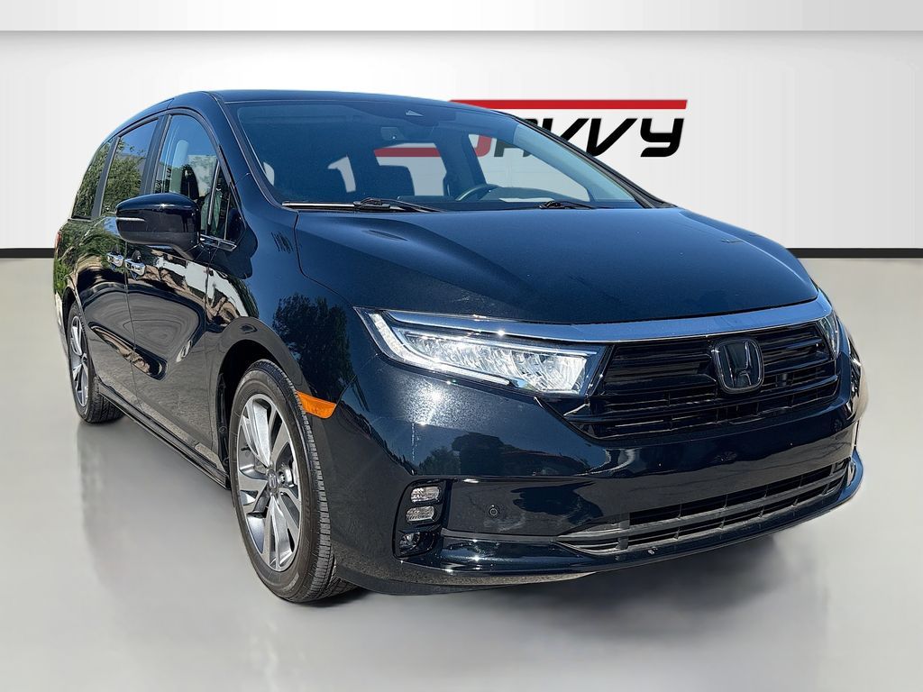 2024 Honda Odyssey Touring — rebuilt & branded title, 6% below market