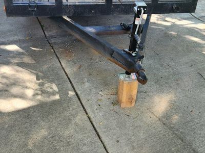 17' flat bed double axle trailer with ramps.