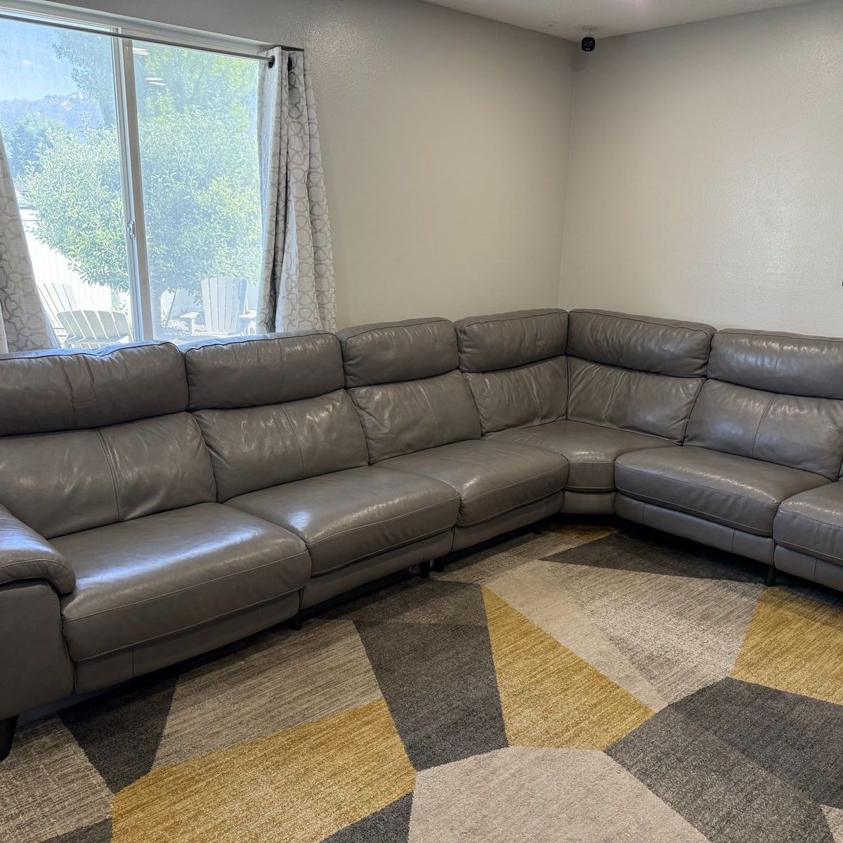 Modern leather sectional with power recliners