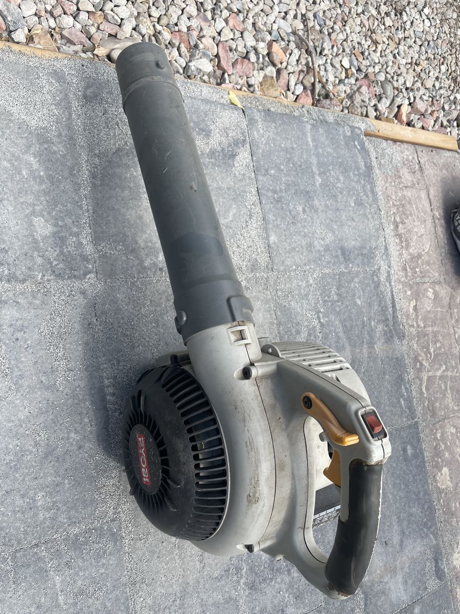Ryobi two-stroke leaf blower lawn cleanup