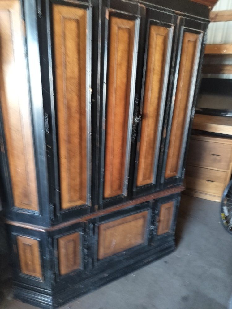 Large hooker brand Wooden Armoire / Entertainment Center in Black and Natural Wood