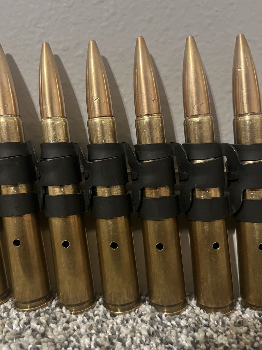 Linked 50 BMG dummy rounds display M2 ma deuce belt