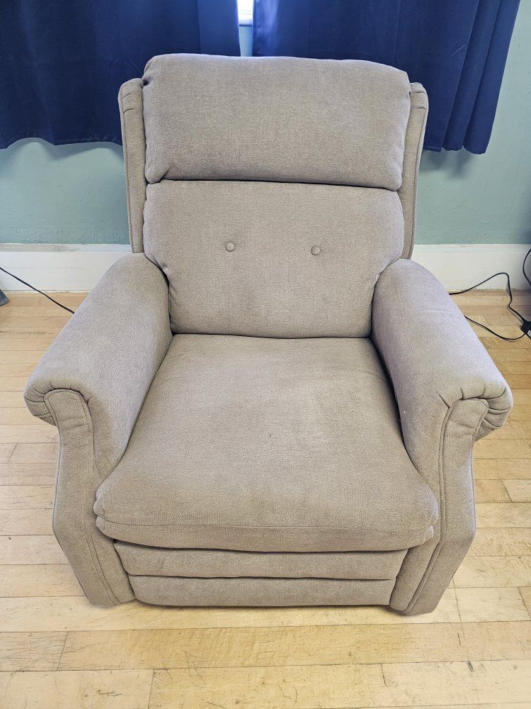 Brown cloth rocker/ electric recliner