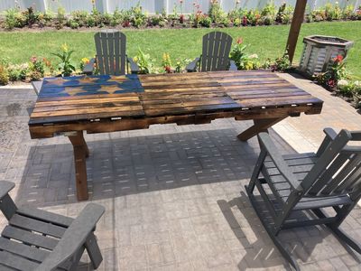 Rustic Wood Outdoor Dining Table with Blue Star Detail