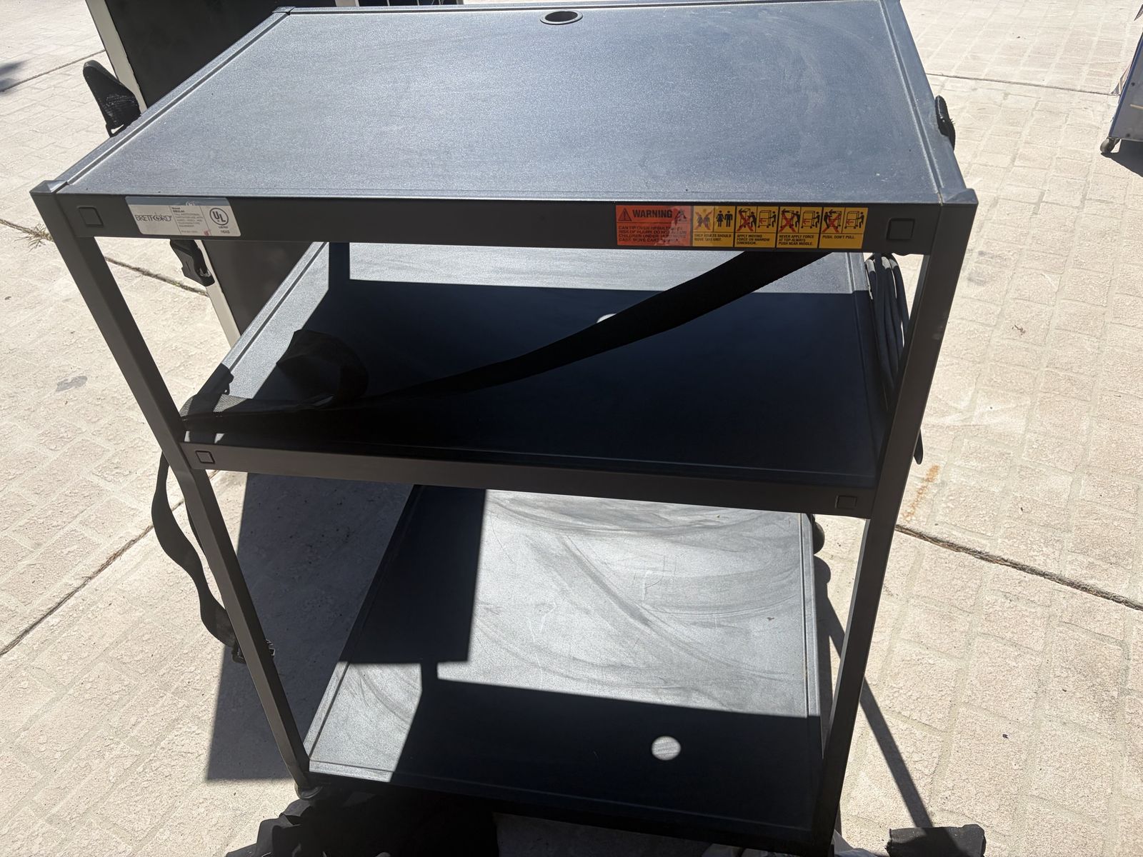 Rolling media workbench with outlet