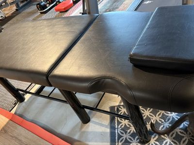 Black sturdy massage table