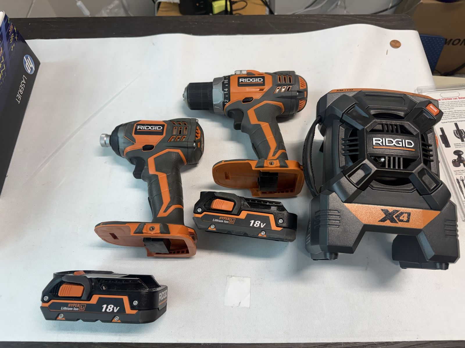 RIDGID Drill, Impact Driver, Radio (missing antenna), and 2 batteries (untested)