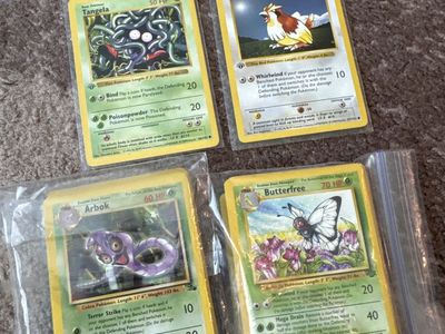 Pokemon Jungle 33-64 and Fossil 31-62 along with two 1st edition shadowless base set
