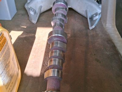 Mopar 440 Cast Aluminum Intake Manifold and Purple Camshaft.