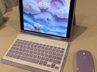 iPad Air (3rd Generation) with lavender case, rechargeable wireless keyboard, mouse, and Apple Pen.