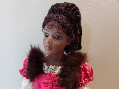 Porcelain Doll. Beautiful pink dress.