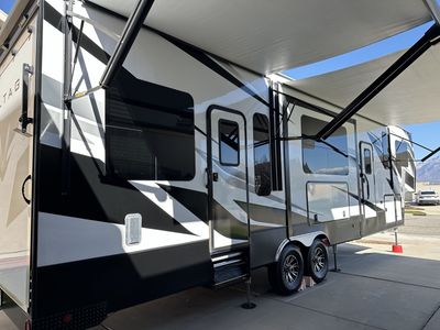 2021 Voltage 3615 Fifth Wheel Toy Hauler - Spacious & Modern RV for Adventure