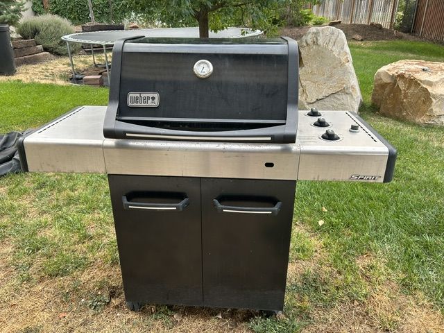 Weber Spirit 3-Burner Propane Gas Grill with Lower Storage Cabinet