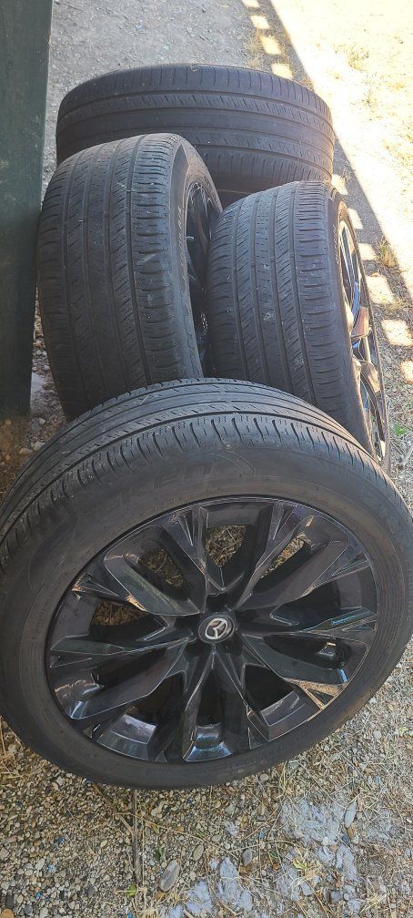 Falken Ziex S/TZ05 275/45R21 107W M+S All-Season Tire with Black Alloy Wheel