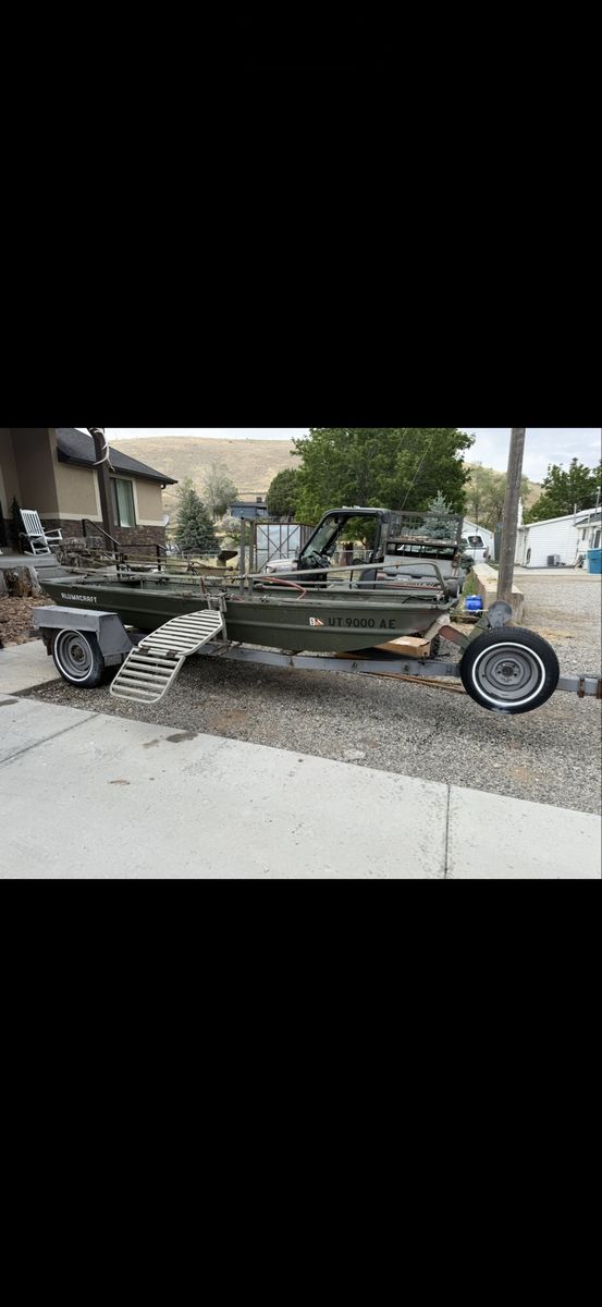 16’ Alumacraft Duck Boat, Motor, and Trailer