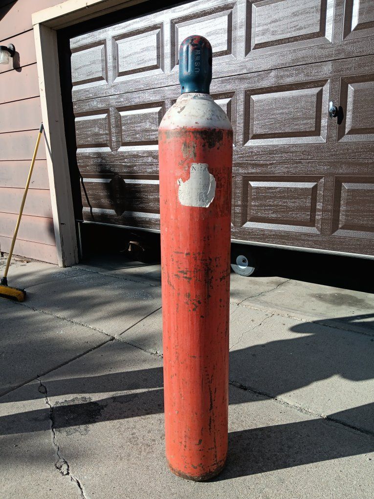 empty helium welding tank 