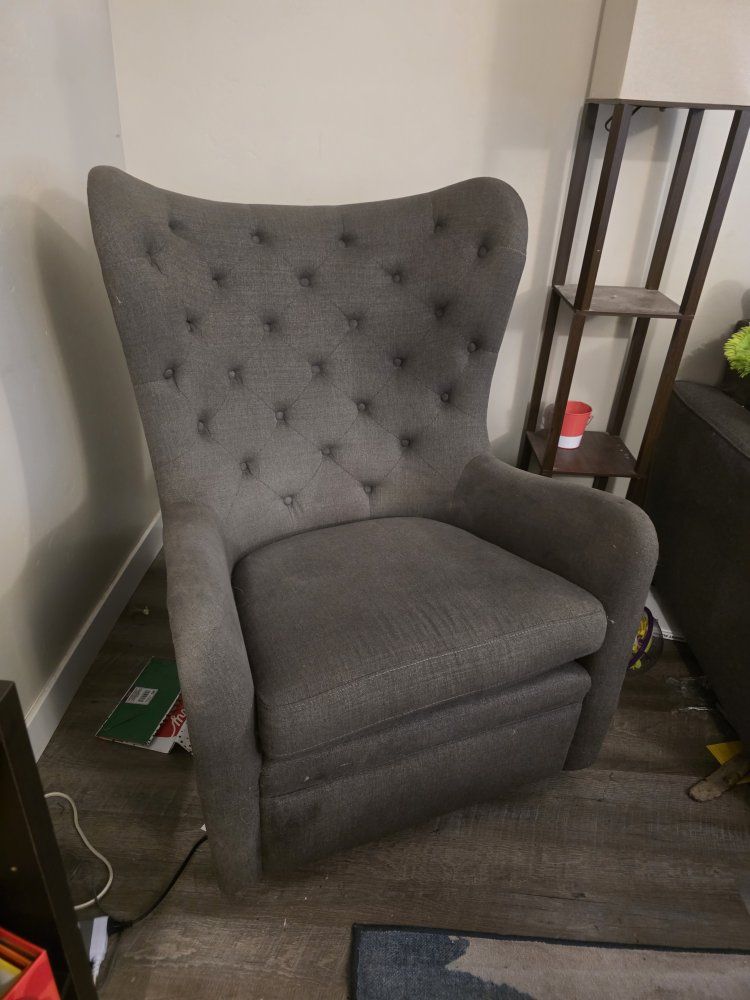 Grey swivel rocking chair