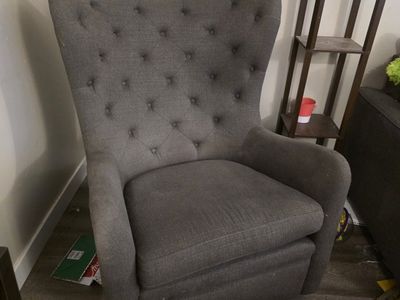 Grey swivel rocking chair