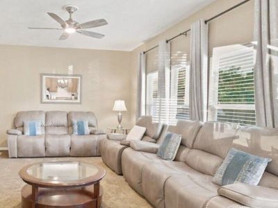 Taupe Power Reclining Sofa, Loveseat, & Recliner Set with Coffee Table & Side Table.